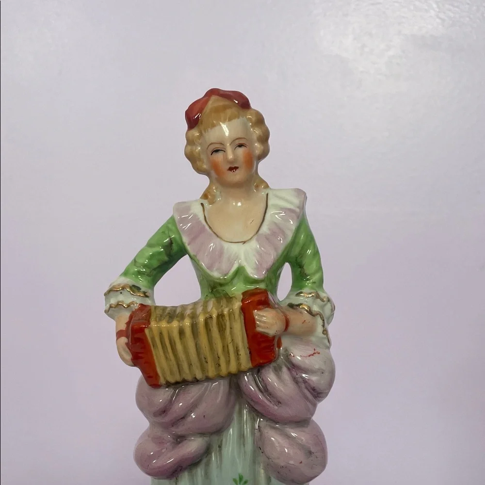 Vintage Porcelain Figurine with Accordion